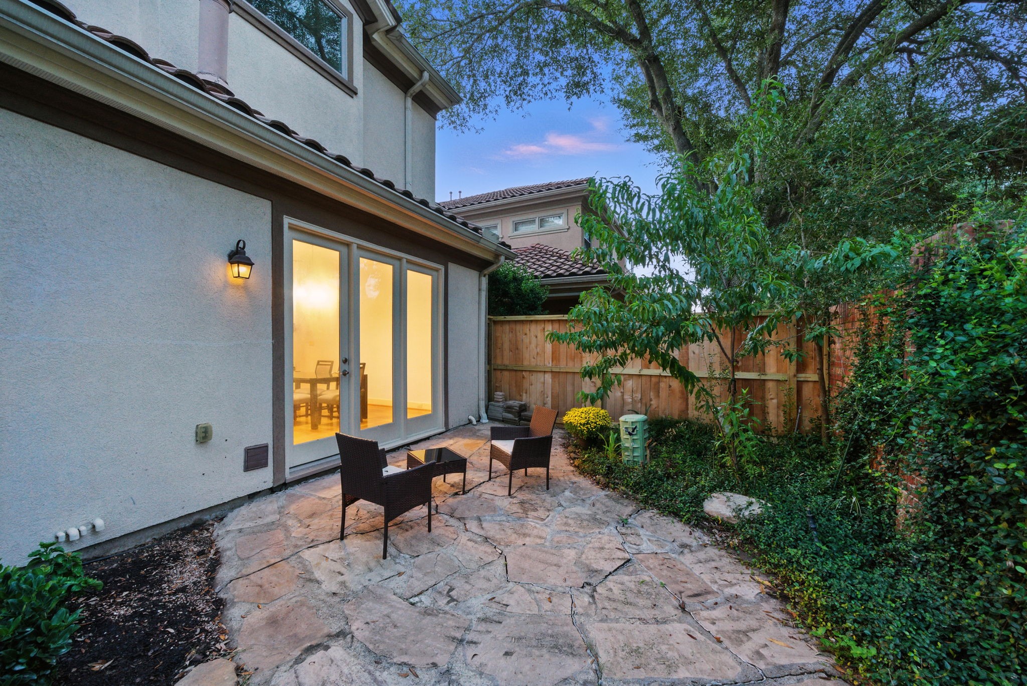 2714 Stuart Manor Houston, TX 77082 - Photo 46 of 49 Whether it’s a summer evening under the stars or a crisp fall morning with coffee in hand, this backyard offers a true extension of the home’s living space—stylish, low-maintenance, and ready to be enjoyed.