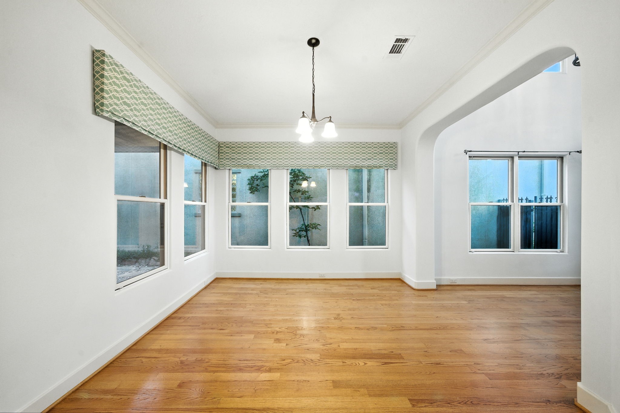 2714 Stuart Manor Houston, TX 77082 - Photo 8 of 49 With its open connection to both the entryway and kitchen, the dining room combines sophistication and functionality, making it a central hub for entertaining in style.