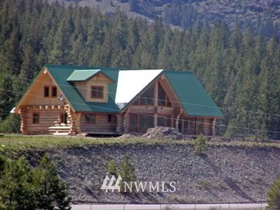 45 Tamarack Road Tonasket, WA 98855 - Photo 1 of 1 front view of a house with a yard