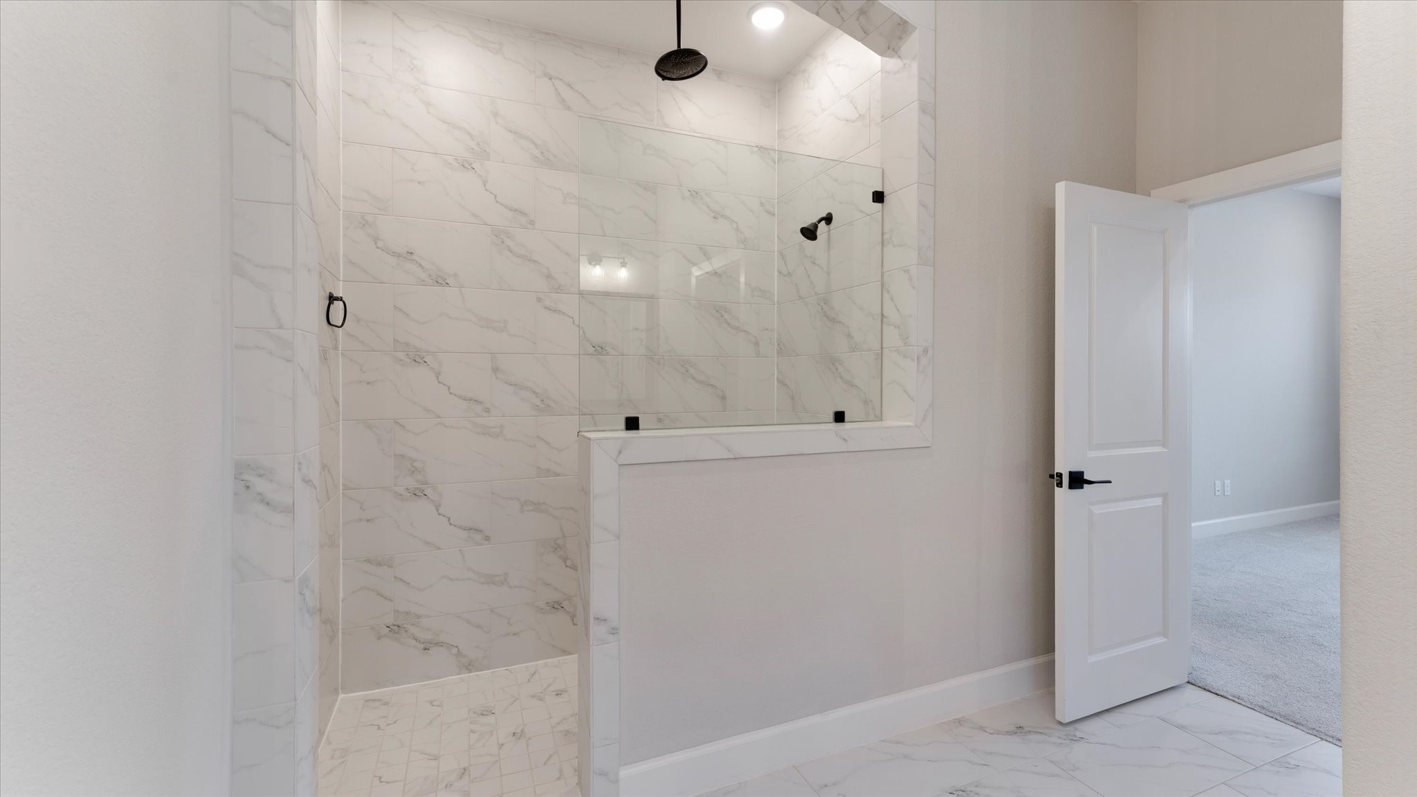 15607 Rising Wren Court Conroe, TX 77302 - Photo 23 of 40 a bathroom with a shower