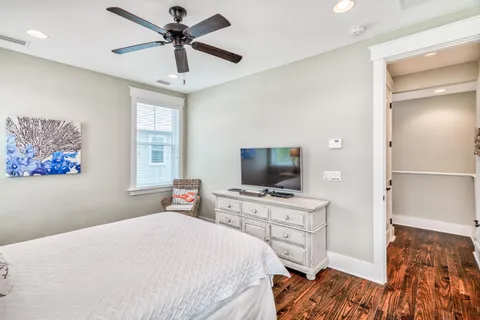 a view of a two chairs in the balcony