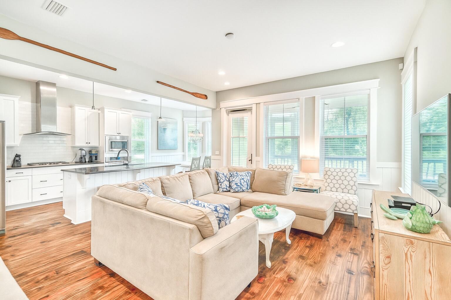 985 Sandgrass Boulevard Santa Rosa Beach, FL 32459 - Photo 8 of 65 a living room with furniture and a large window