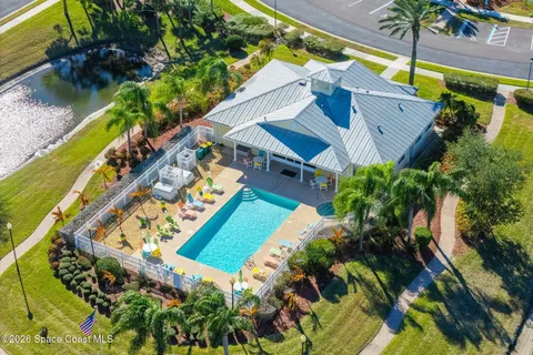 an aerial view of a house with a garden