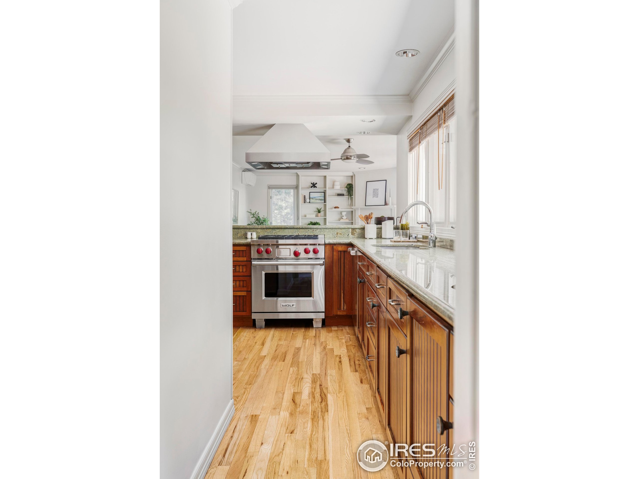 2672 Winding Trail Drive Boulder, CO 80304 - Photo 17 of 31 a kitchen with stainless steel appliances granite countertop a stove and a sink