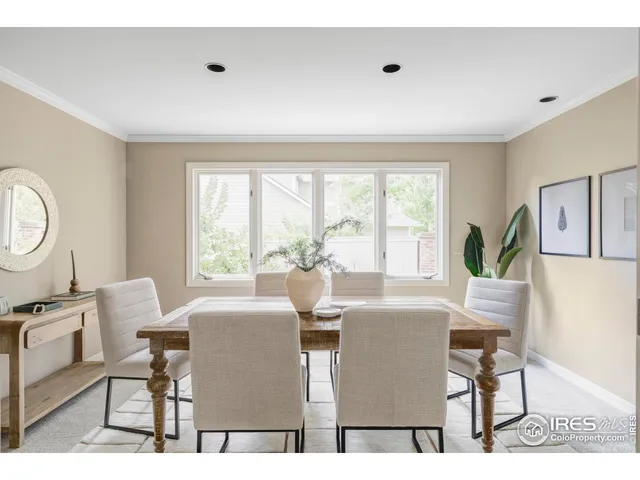 a workspace with furniture and a window