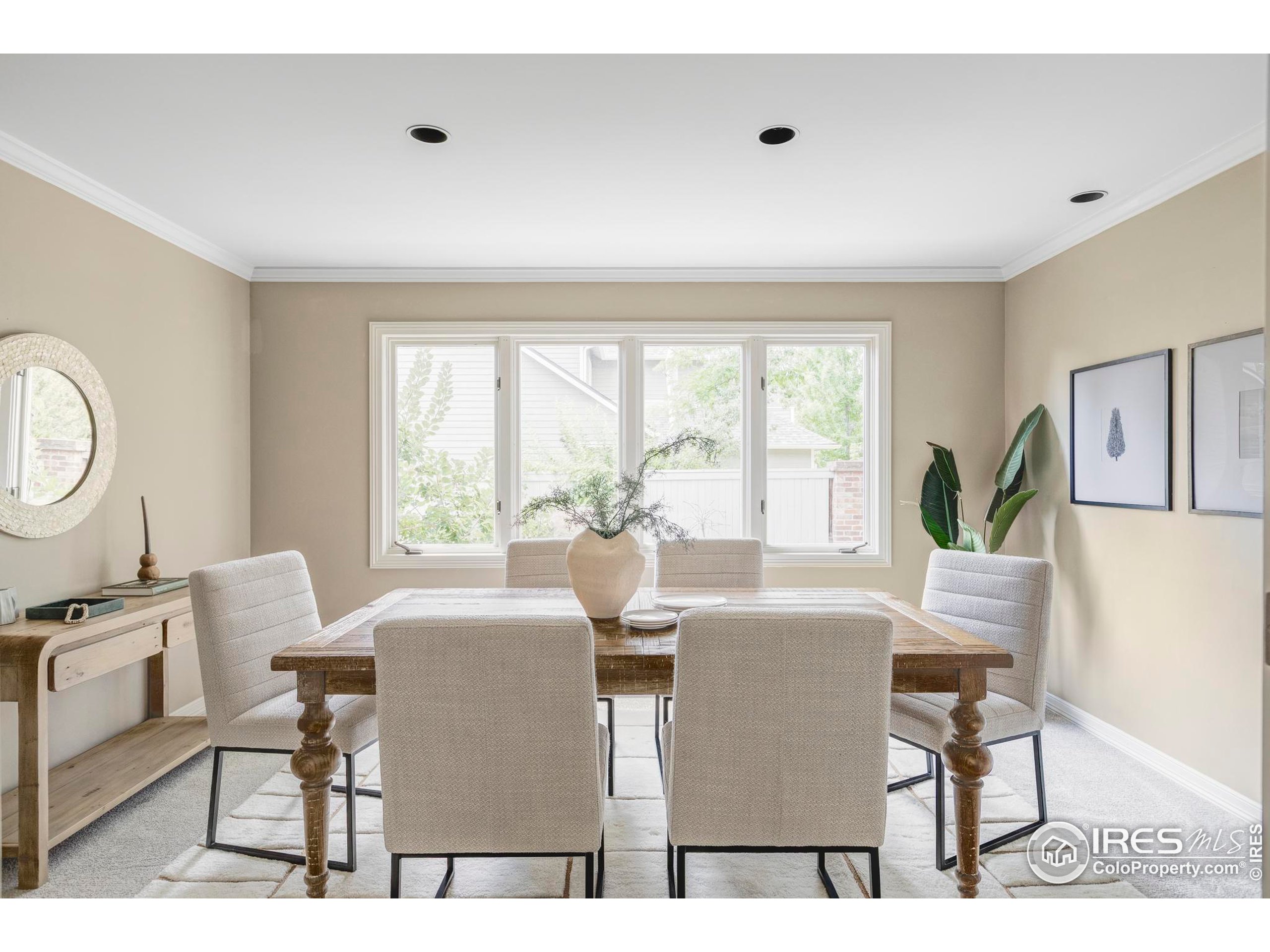 2672 Winding Trail Drive Boulder, CO 80304 - Photo 19 of 31 a view of a dining room with furniture window and outside view
