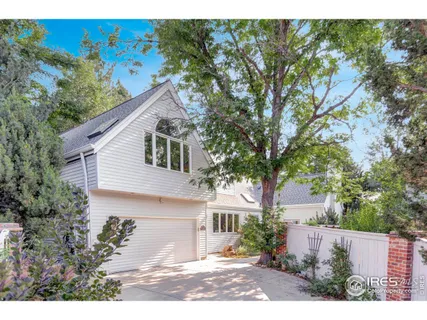 a kitchen with a sink cabinets and window