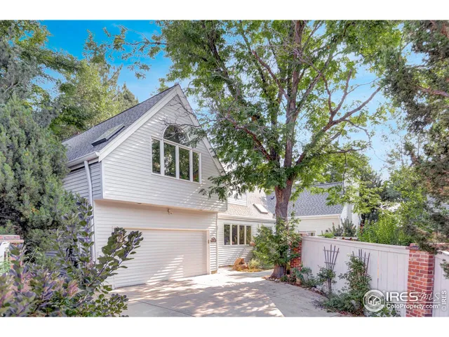 a kitchen with a sink cabinets and window