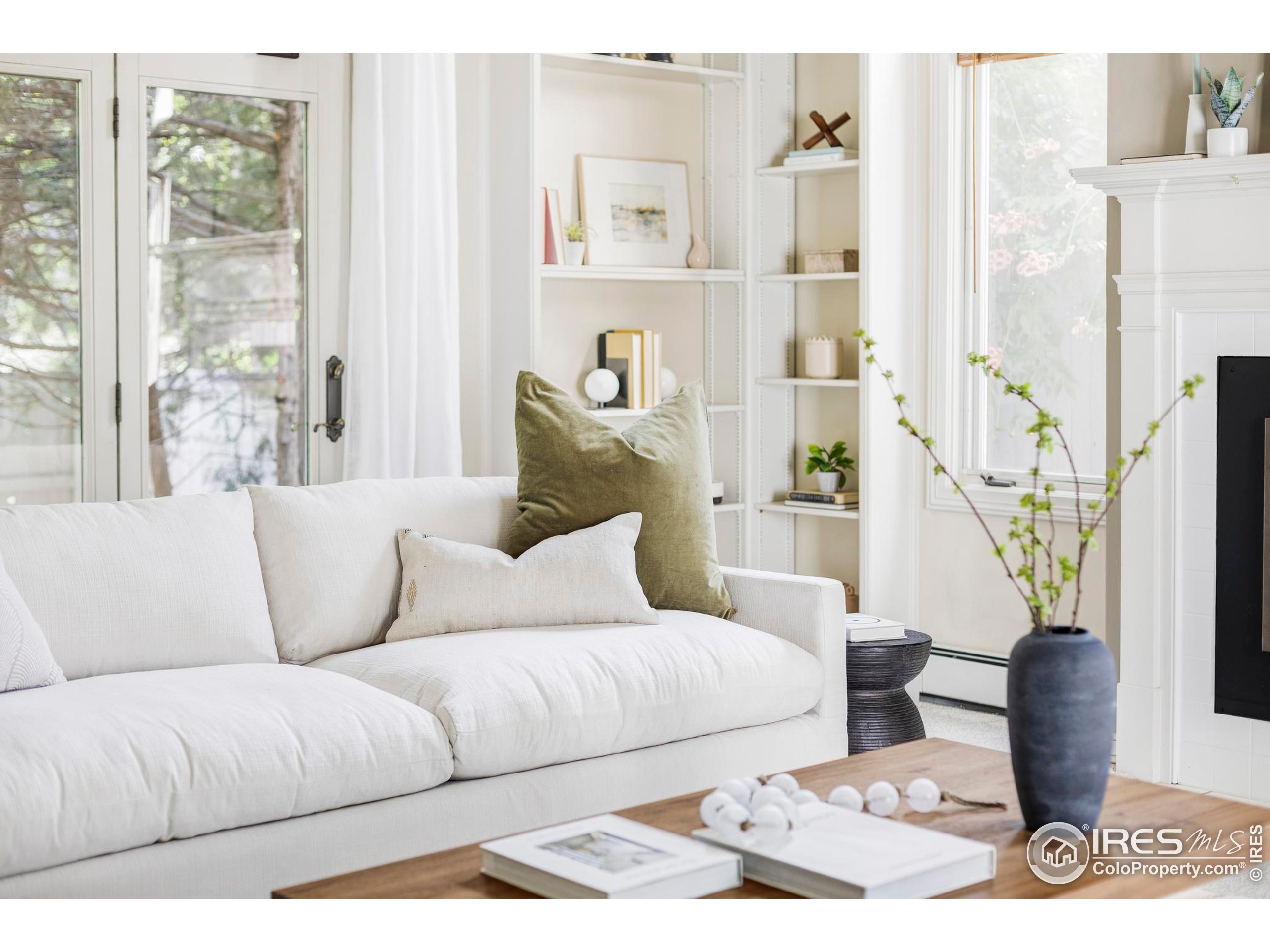 2672 Winding Trail Drive Boulder, CO 80304 - Photo 4 of 31 a living room with furniture and a potted plant