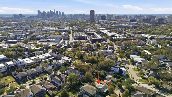 an aerial view of a city with lots of residential buildings