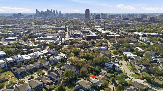 an aerial view of a city with lots of residential buildings