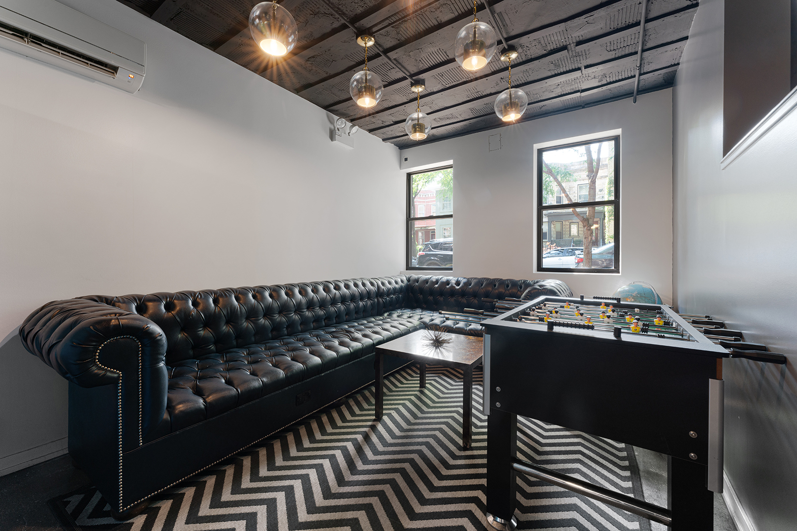 4875 North Magnolia Avenue, Unit 104 Chicago, IL 60640 - Photo 2 of 4 a view of a couch in the room