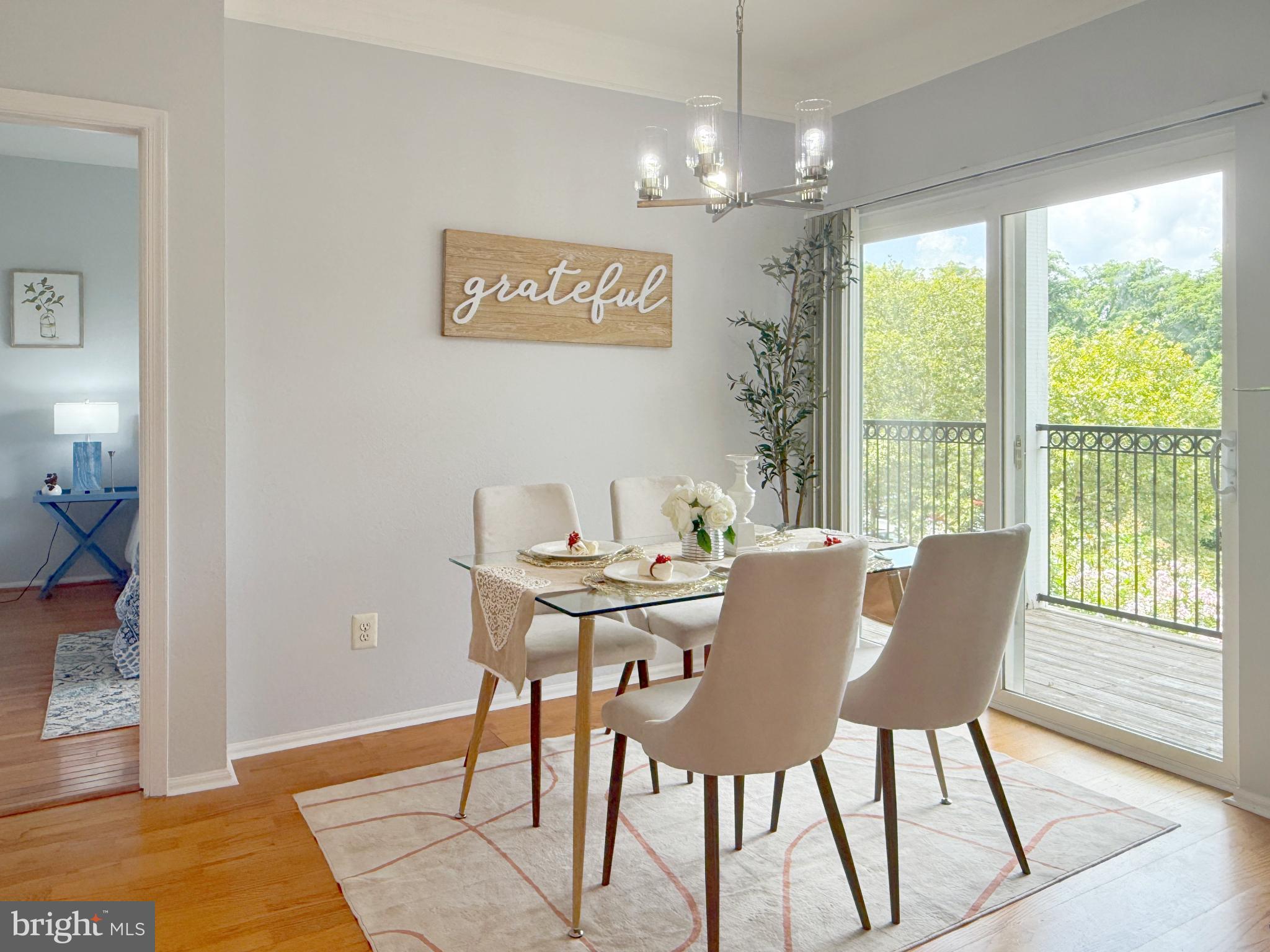 1530 Spring Gate Dr., Unit 9317 McLean, VA 22102 - Photo 11 of 55 Bright dining space with serene views.