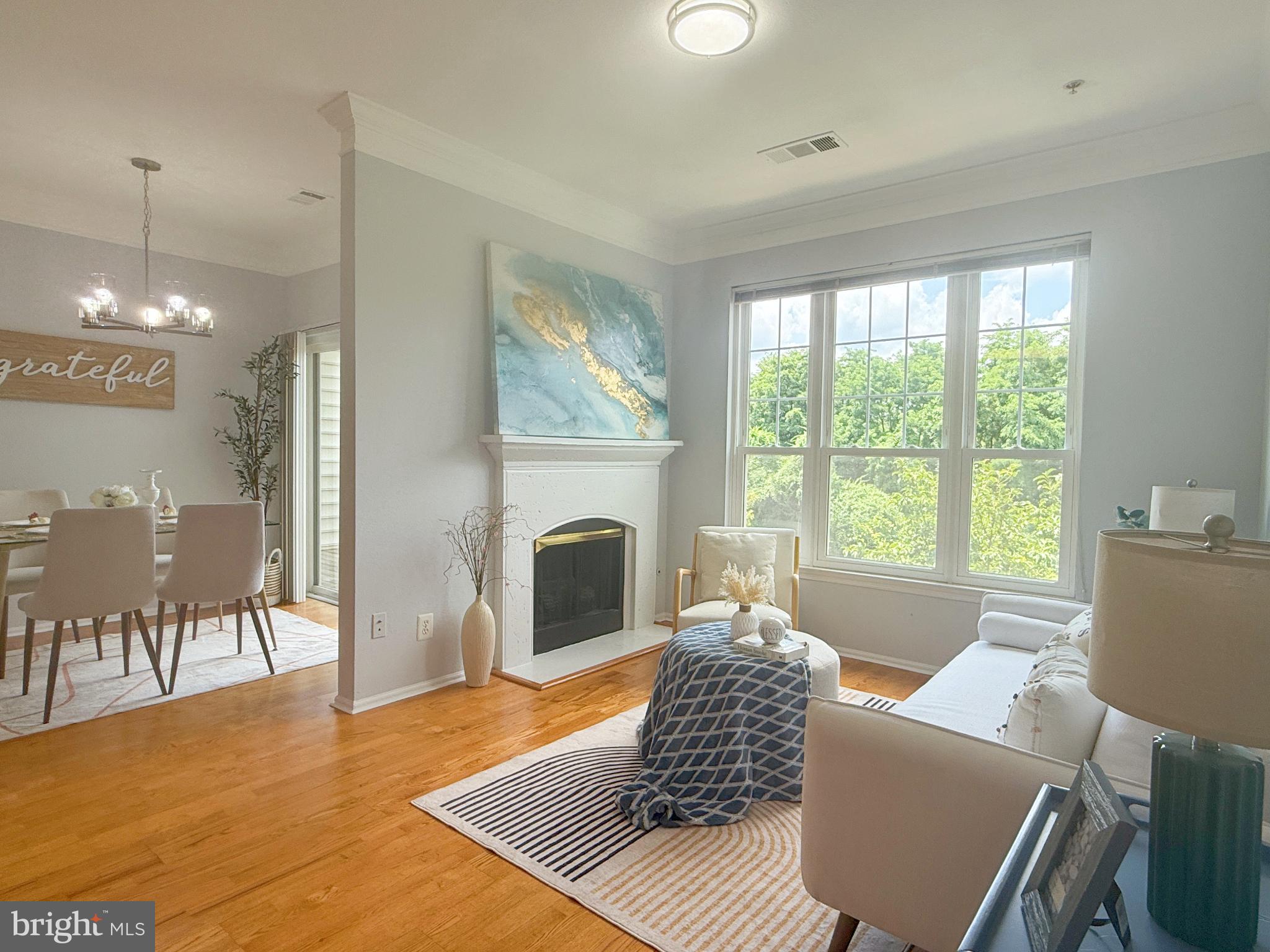 1530 Spring Gate Dr., Unit 9317 McLean, VA 22102 - Photo 3 of 55 Bright and airy living space with nature views.