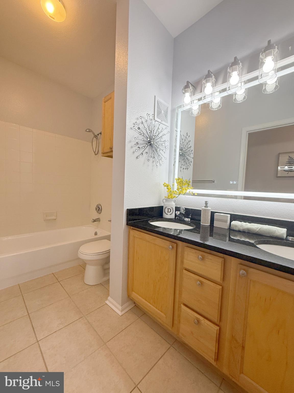 1530 Spring Gate Dr., Unit 9317 McLean, VA 22102 - Photo 38 of 55 Modern bathroom with sleek finishes.