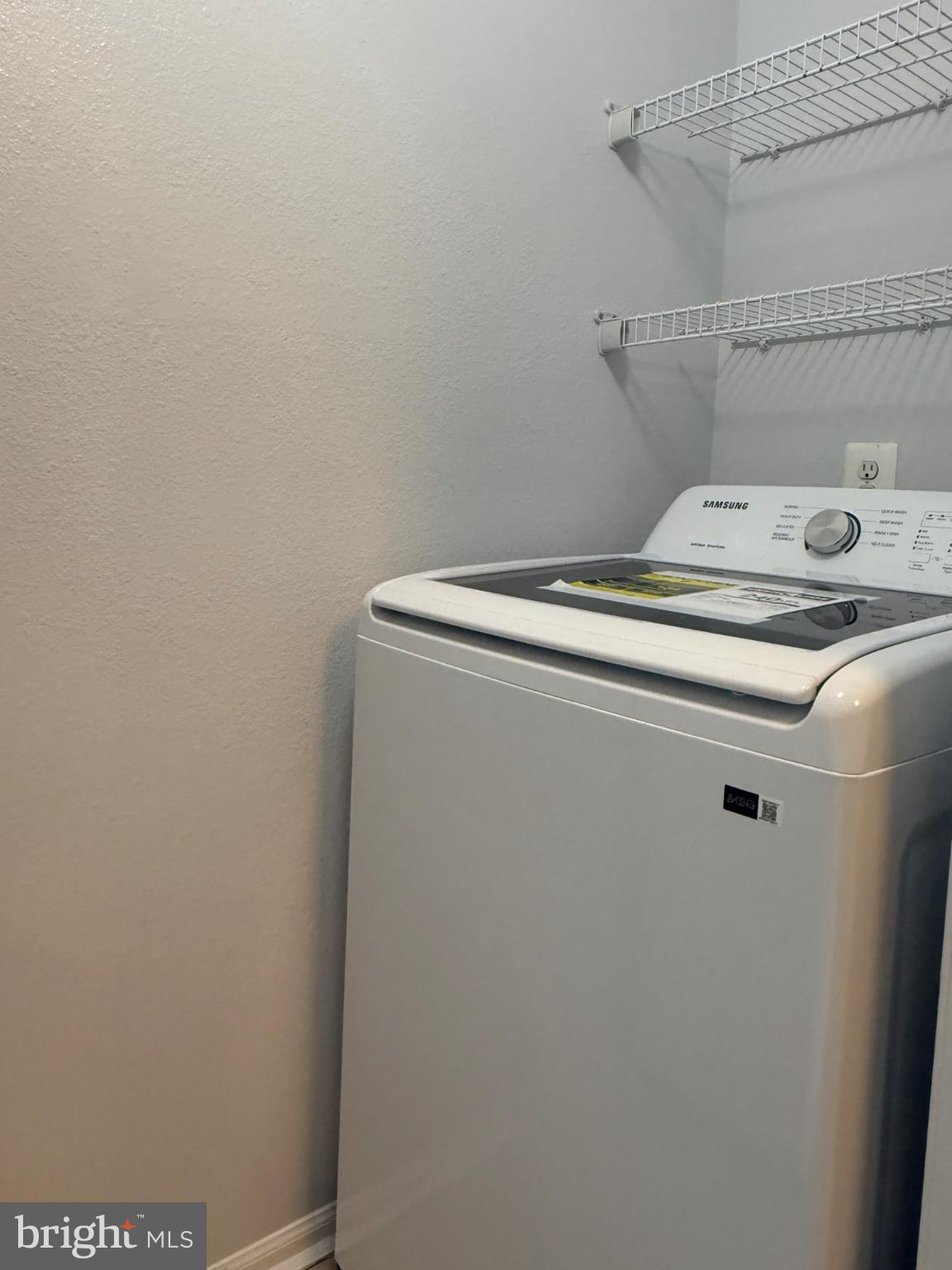 1530 Spring Gate Dr., Unit 9317 McLean, VA 22102 - Photo 42 of 55 Modern laundry space with ample storage.