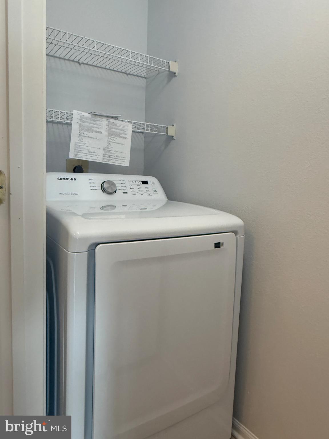 1530 Spring Gate Dr., Unit 9317 McLean, VA 22102 - Photo 43 of 55 Modern laundry space with sleek appliances.