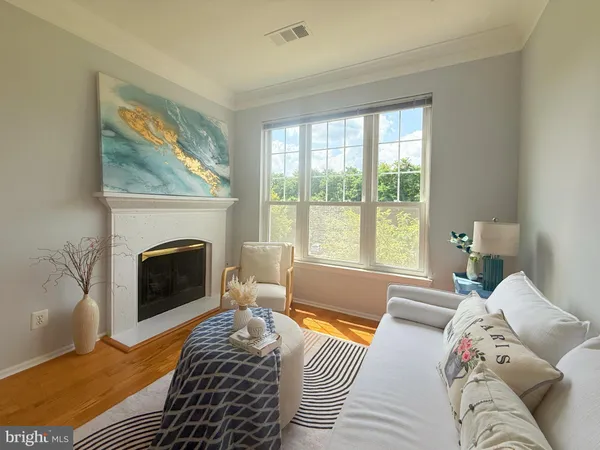 a bedroom with a bed and a fireplace
