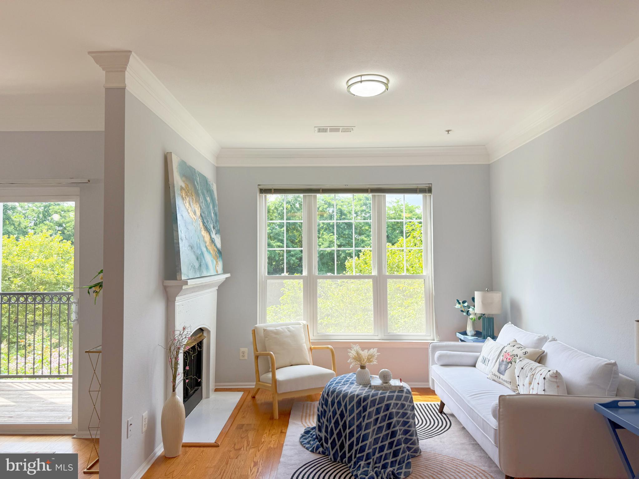 1530 Spring Gate Dr., Unit 9317 McLean, VA 22102 - Photo 8 of 55 Bright and airy living space with nature views.