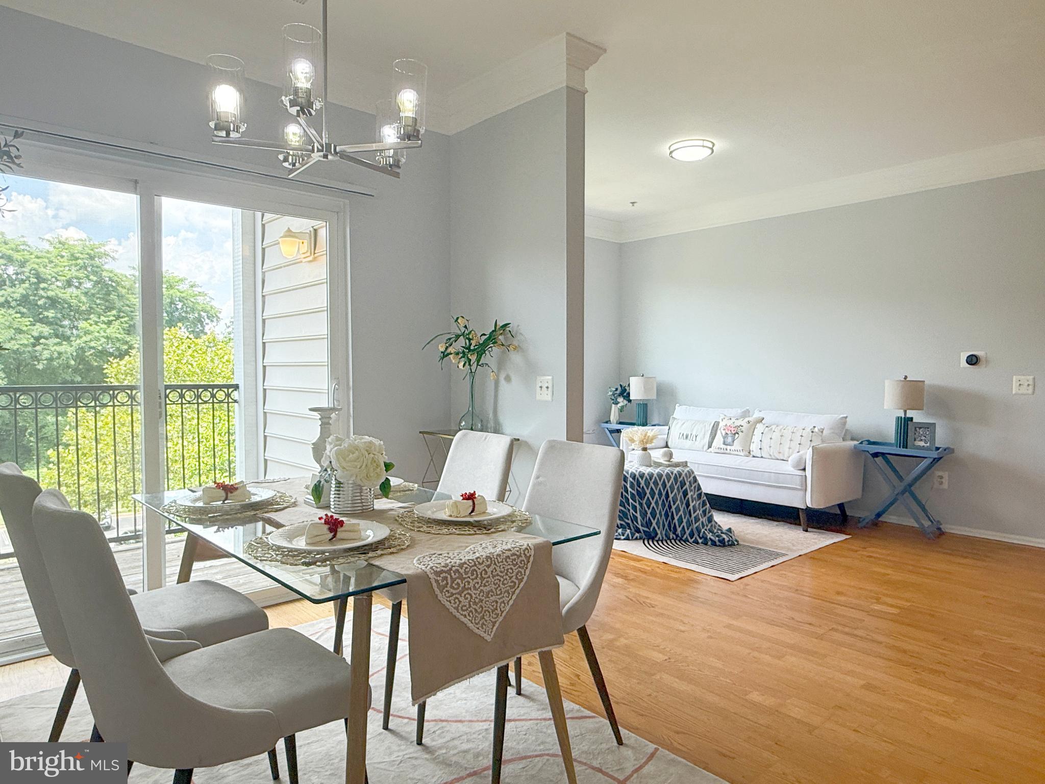 1530 Spring Gate Dr., Unit 9317 McLean, VA 22102 - Photo 10 of 55 Bright and airy dining space with balcony view.