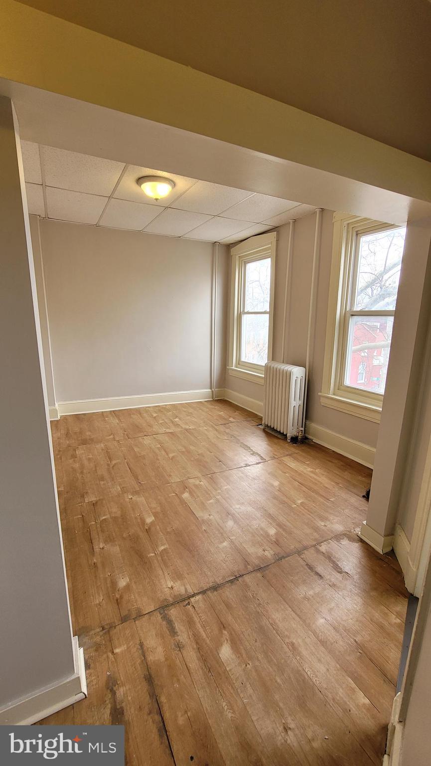 19 South 11th Street, Unit 3 Reading, PA 19602 - Photo 9 of 15 a view of an empty room with a window