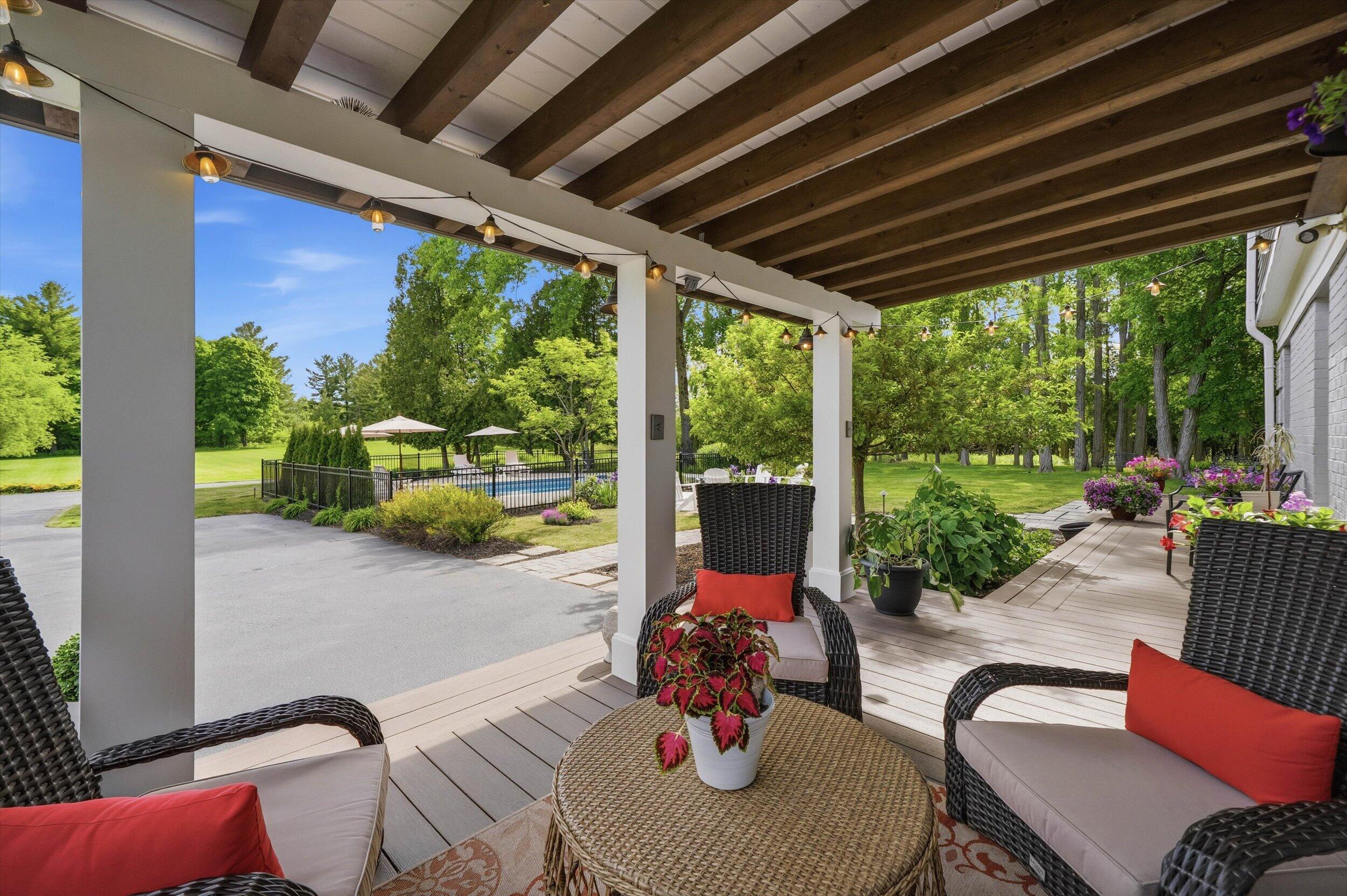 9431 Hawthorne Road Mequon, WI 53097 - Photo 40 of 67 Rear patio w/view to pool