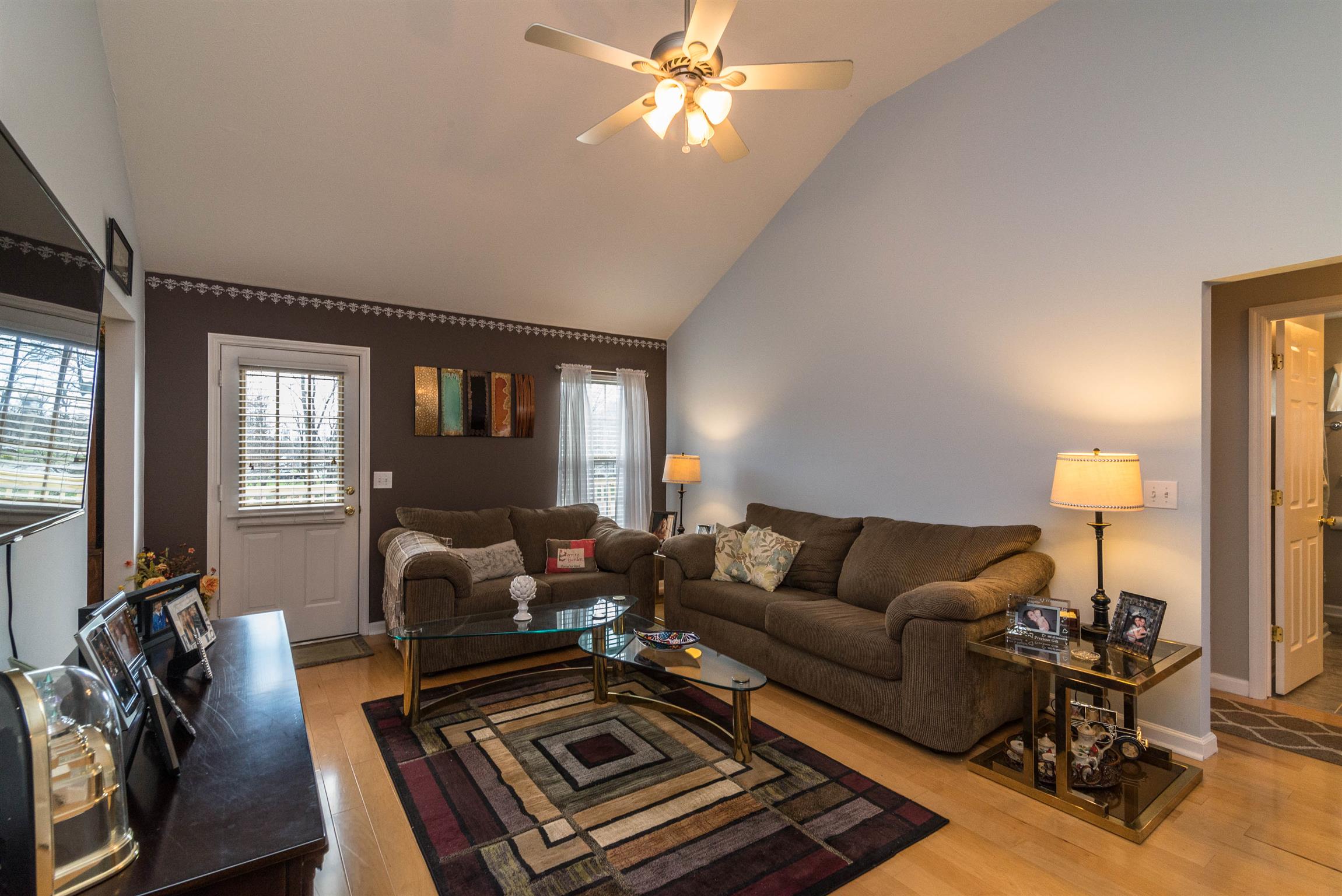 1355 Cedar Grove Road Lebanon, TN 37087 - Photo 3 of 12 a living room with furniture a lamp and a flat screen tv