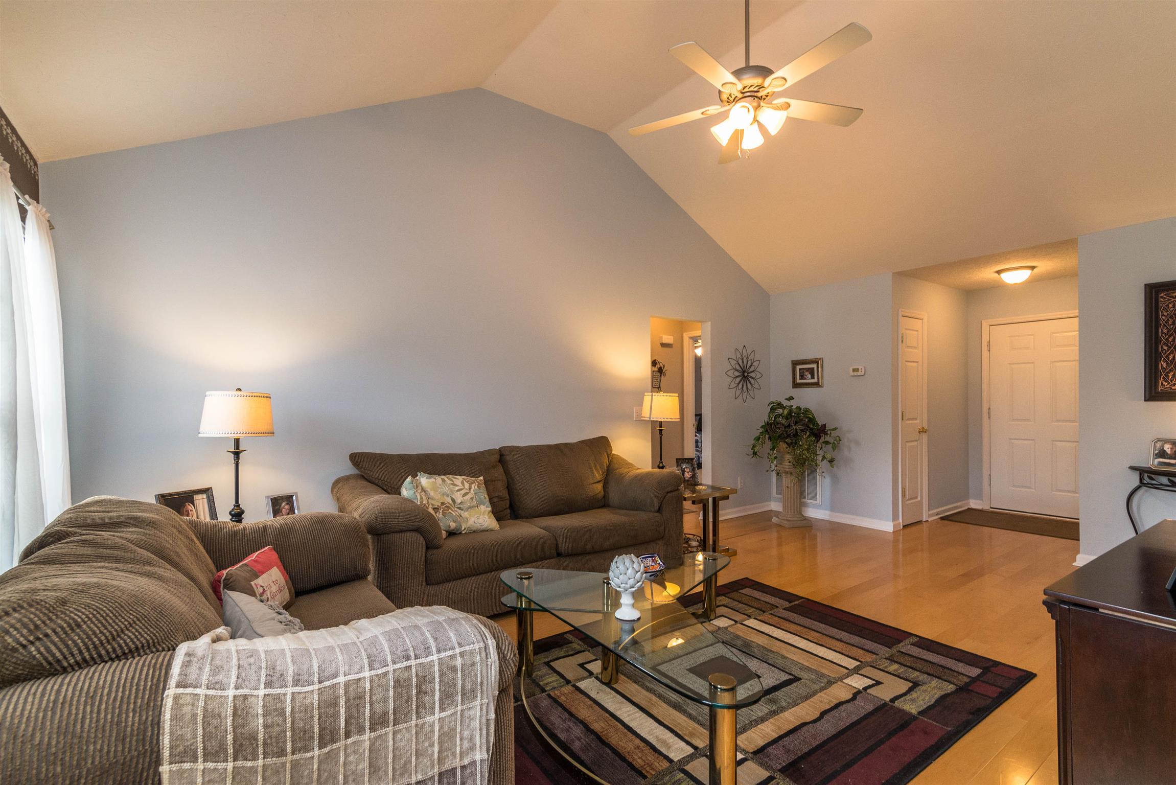 1355 Cedar Grove Road Lebanon, TN 37087 - Photo 5 of 12 a living room with furniture and a chandelier