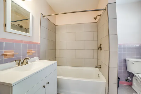 a bathroom with a sink and a bathtub