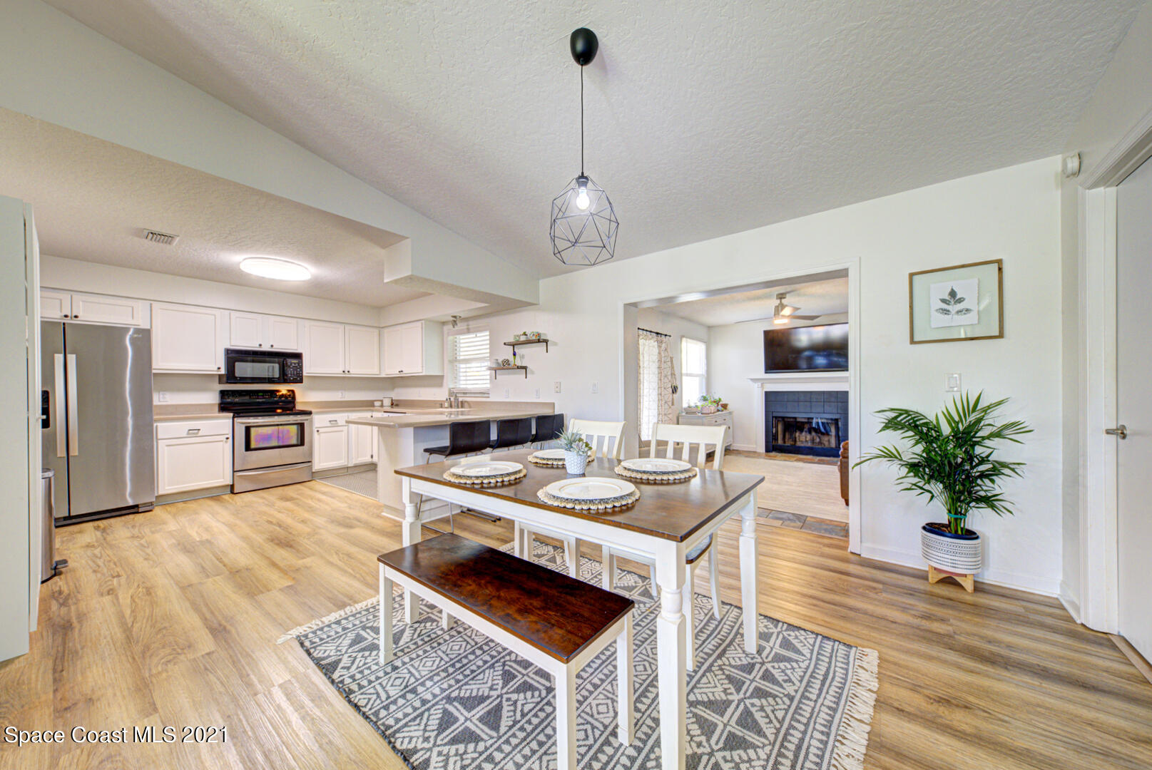 860 Croton Road Rockledge, FL 32955 - Photo 11 of 24 dining room open to kitchen