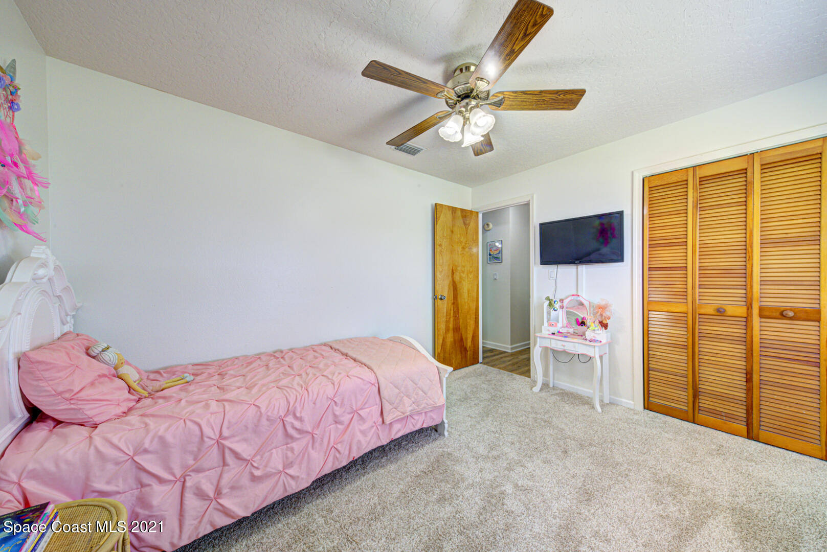 860 Croton Road Rockledge, FL 32955 - Photo 14 of 24 bedroom 3 with carpet