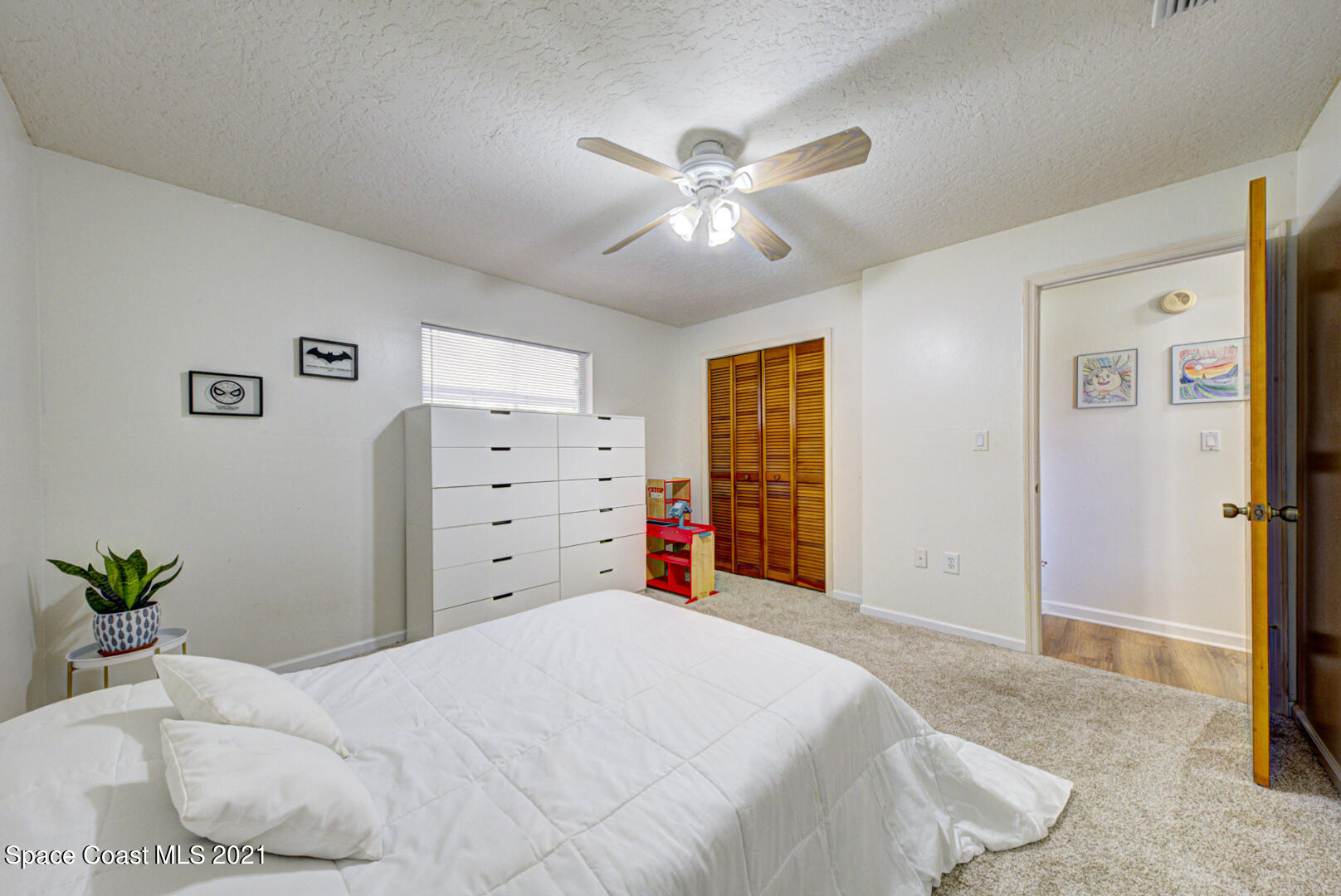 860 Croton Road Rockledge, FL 32955 - Photo 16 of 24 bedroom 2 with carpet