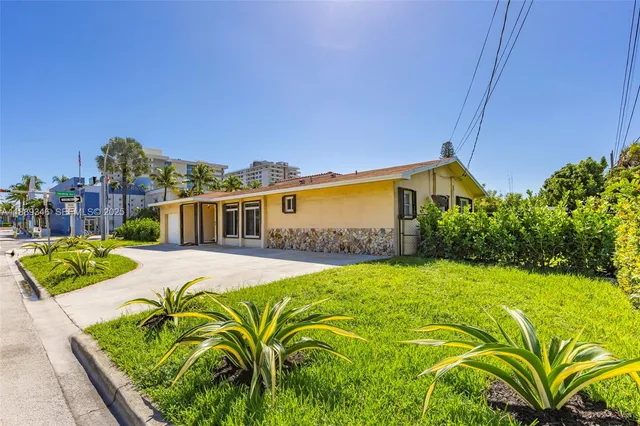 a view of a hallway view with staircase