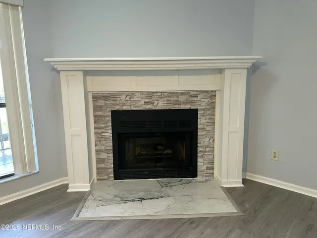 a living room with a fireplace