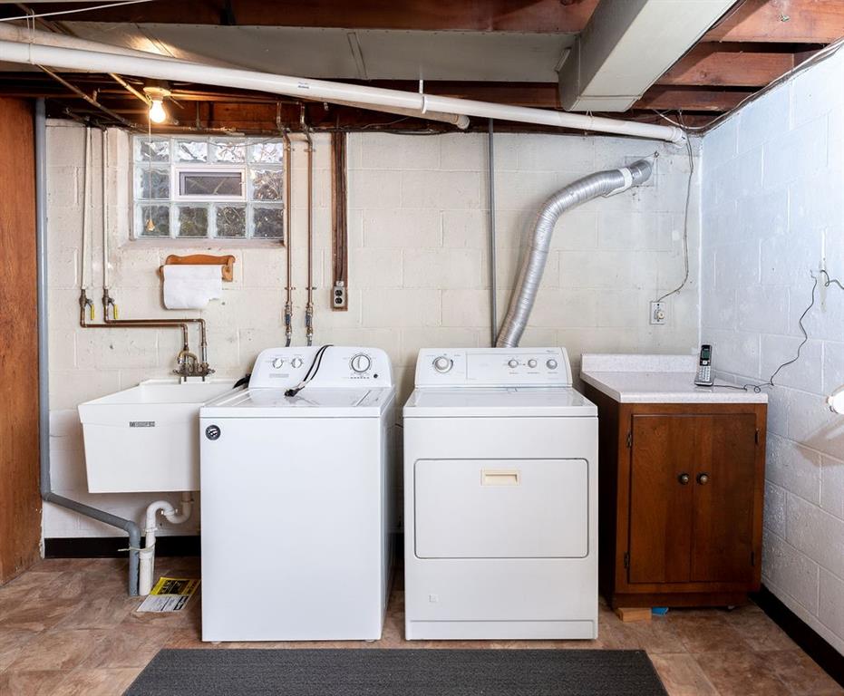 767 Virginia Avenue Rochester, PA 15074 - Photo 14 of 16 a utility room with dryer and washer
