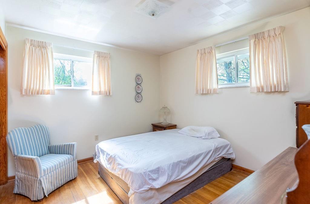 767 Virginia Avenue Rochester, PA 15074 - Photo 8 of 16 a bedroom with a bed and a couch