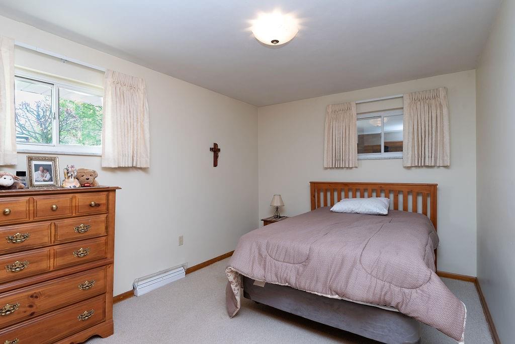 767 Virginia Avenue Rochester, PA 15074 - Photo 10 of 16 a bedroom with a bed and a window