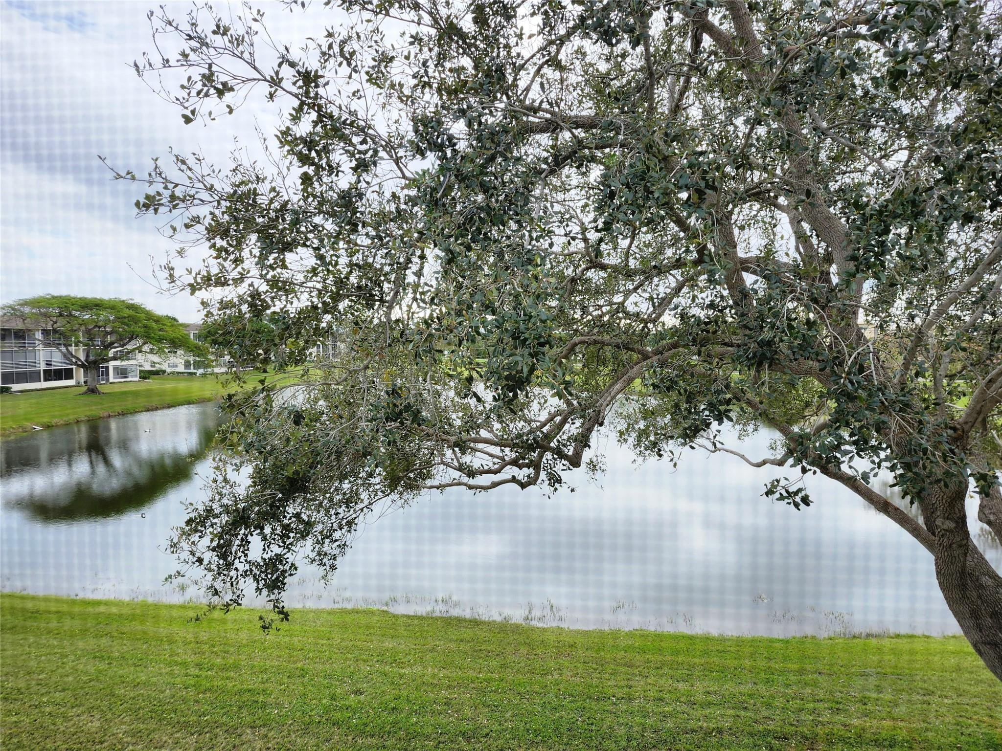 74 Preston Way Boca Raton, FL 33434 - Photo 20 of 28 a view of a lake with outdoor space