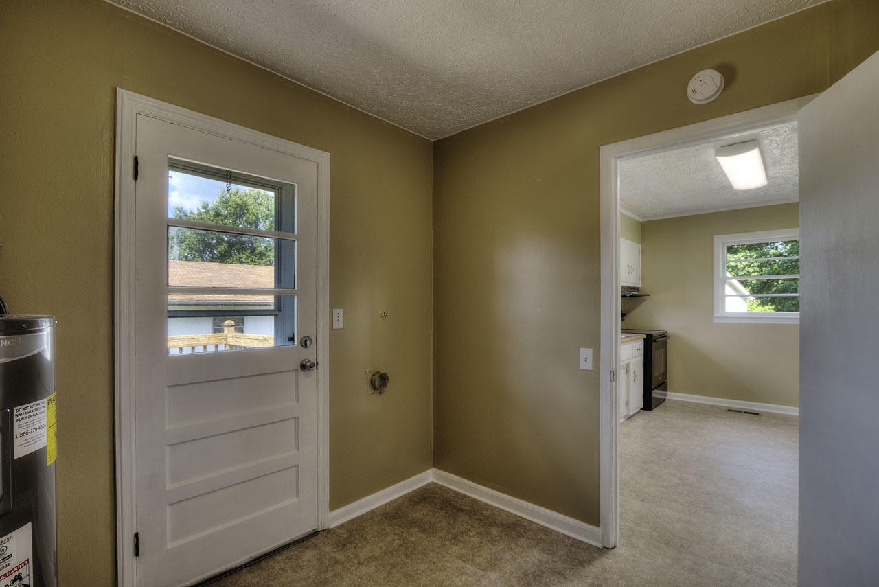 102 Stephens Road Greenback, TN 37742 - Photo 14 of 31 a view of room with window and a hallway