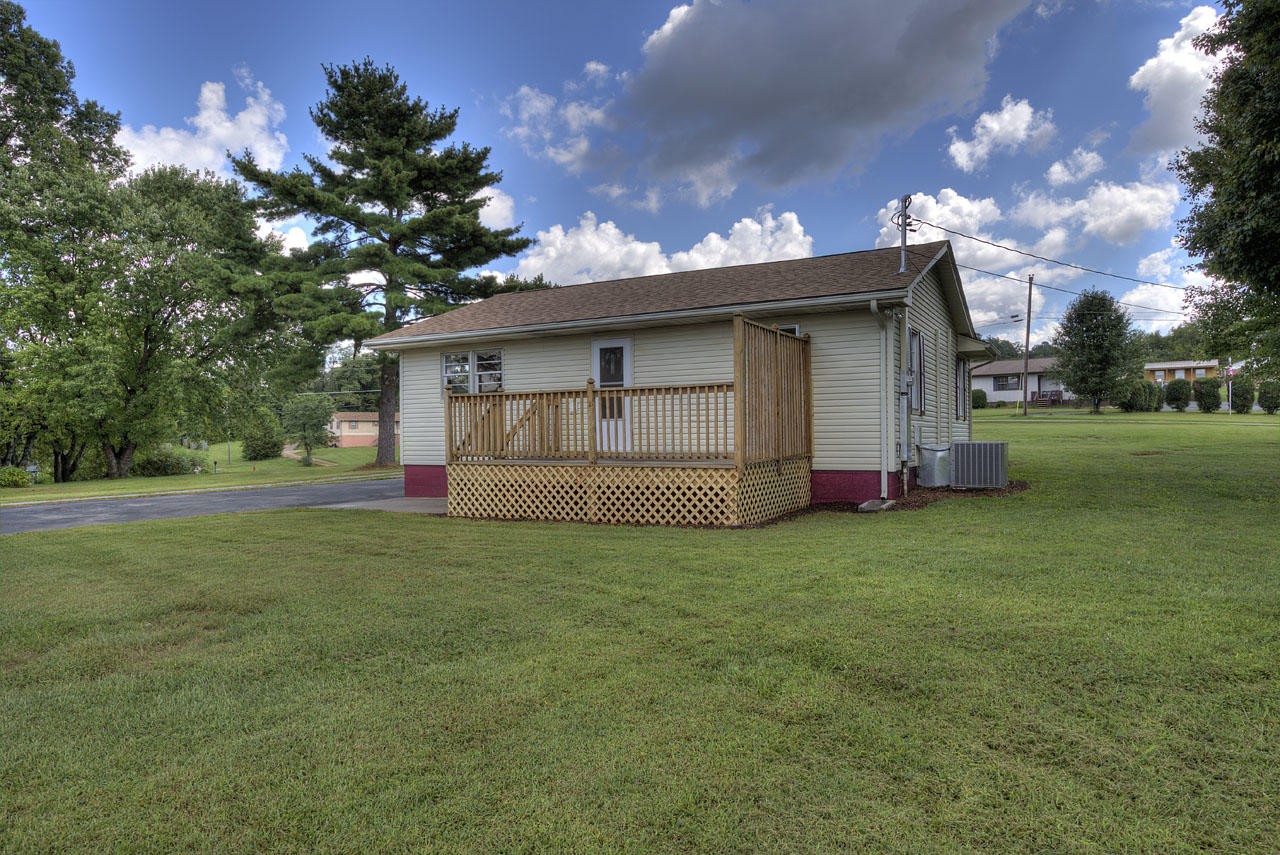 102 Stephens Road Greenback, TN 37742 - Photo 21 of 31 a view of a backyard with a garden and entertaining space