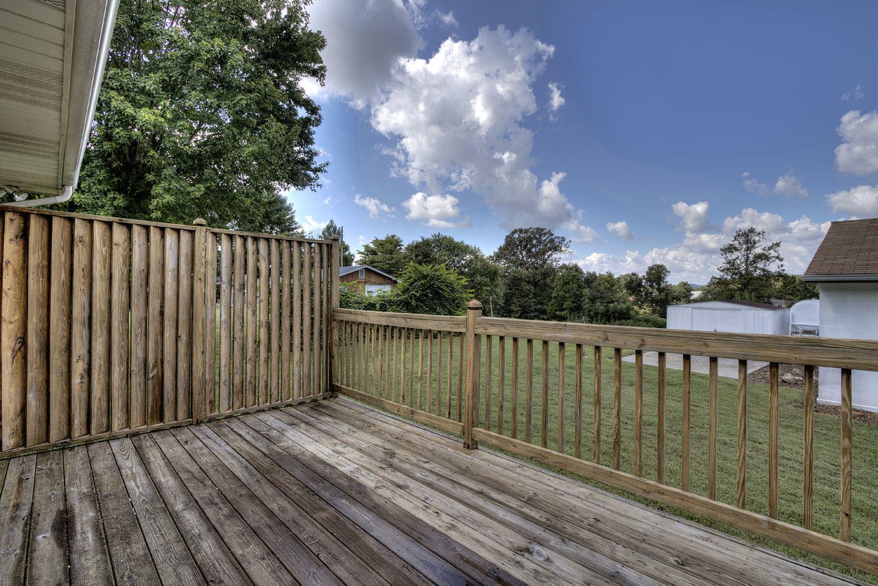 102 Stephens Road Greenback, TN 37742 - Photo 23 of 31 a balcony with wooden floor