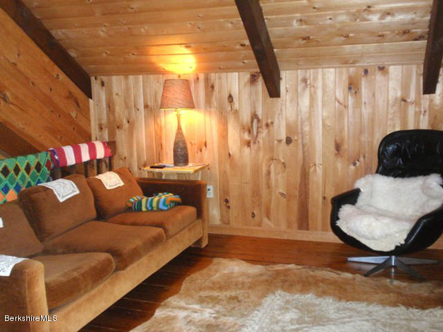 248 Stebbins Road Otis, MA 01253 - Photo 14 of 16 a bedroom with a couch and a window