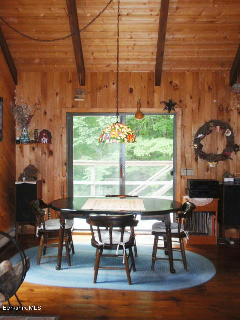 248 Stebbins Road Otis, MA 01253 - Photo 7 of 16 a view of a dining room with furniture window and outside view