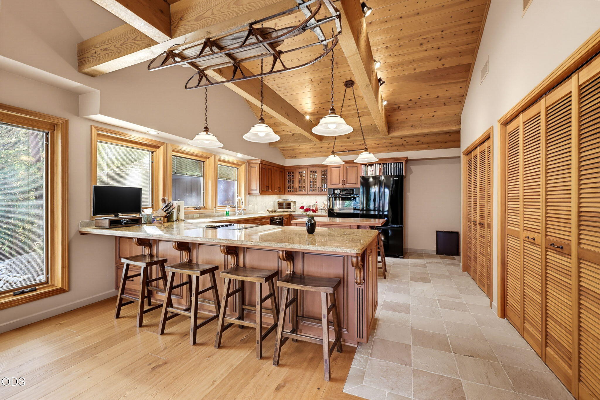 2459 Little Applegate Road Jacksonville, OR 97530 - Photo 15 of 86 a large kitchen with a table and chairs