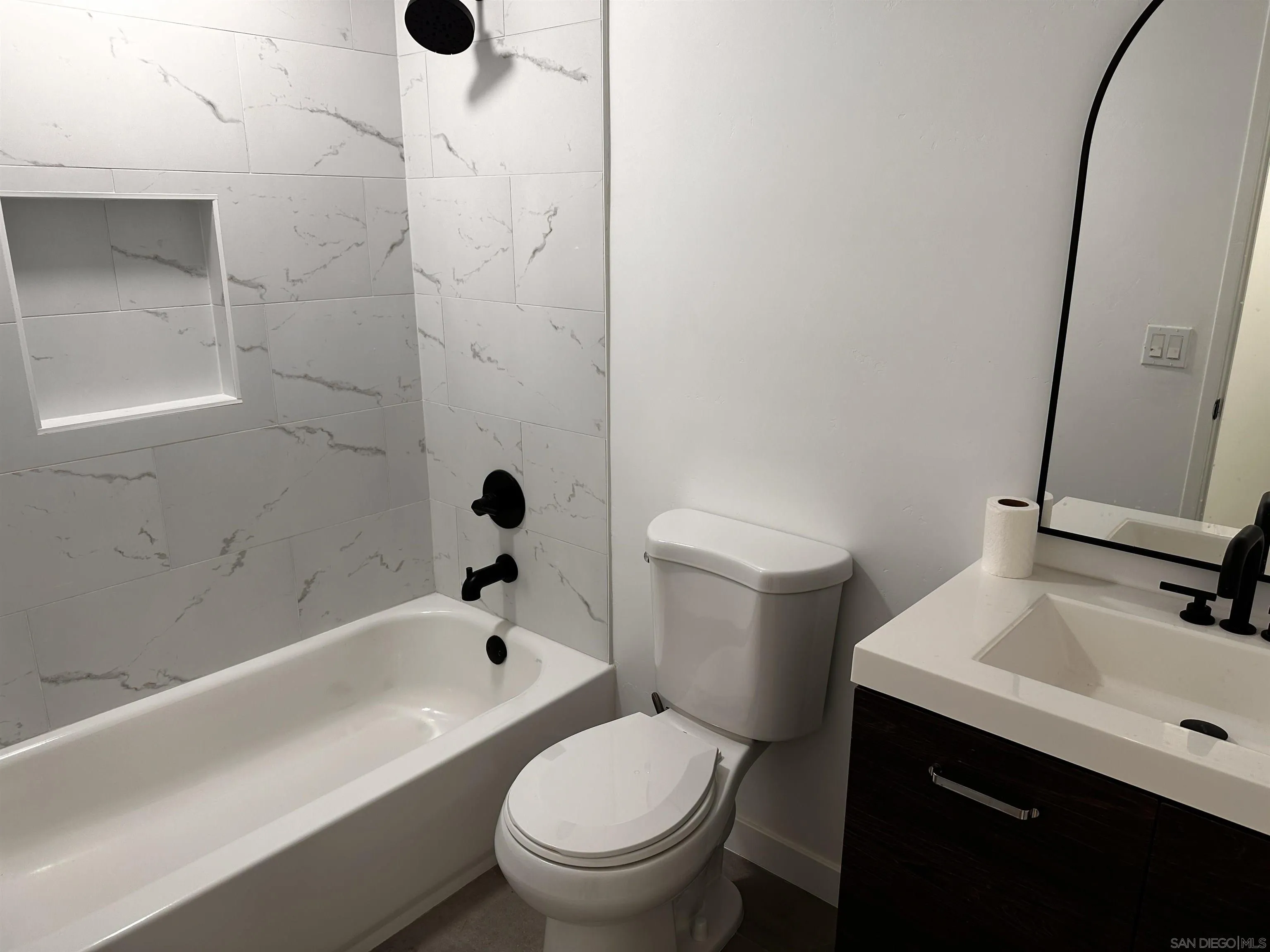 12733 McFeron Road Poway, CA 92064 - Photo 14 of 69 a white toilet sitting next to a bath tub