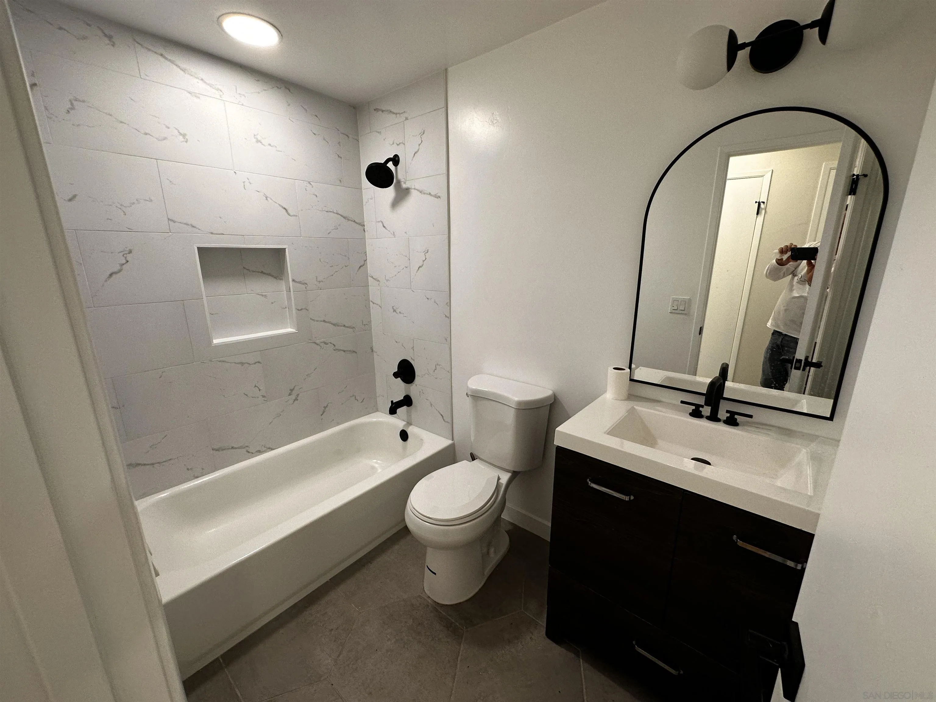 12733 McFeron Road Poway, CA 92064 - Photo 15 of 69 a bathroom with a sink a toilet and a mirror