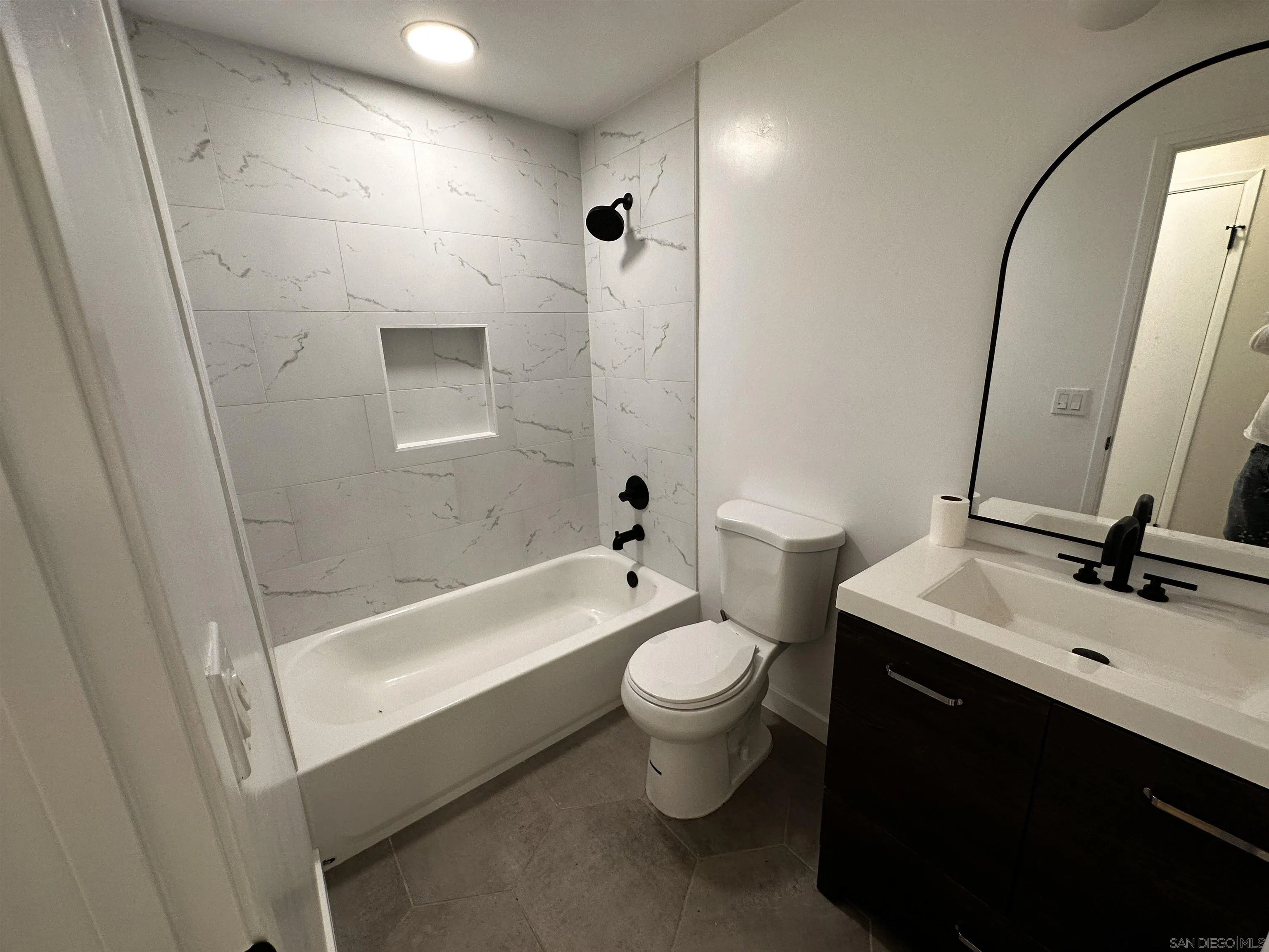 12733 McFeron Road Poway, CA 92064 - Photo 16 of 69 a bathroom with a sink a toilet and shower