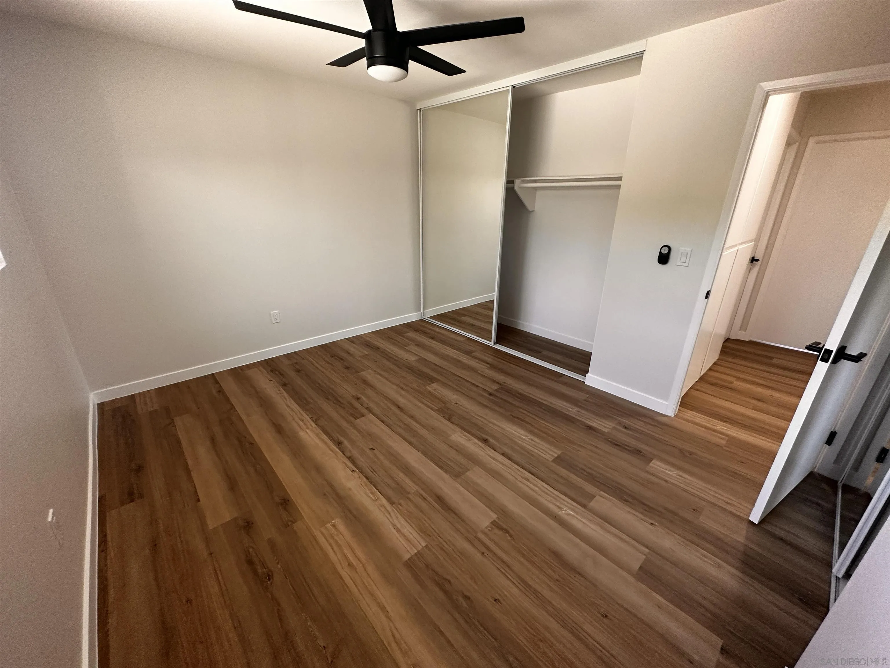 12733 McFeron Road Poway, CA 92064 - Photo 27 of 69 a view of a livingroom with wooden floor