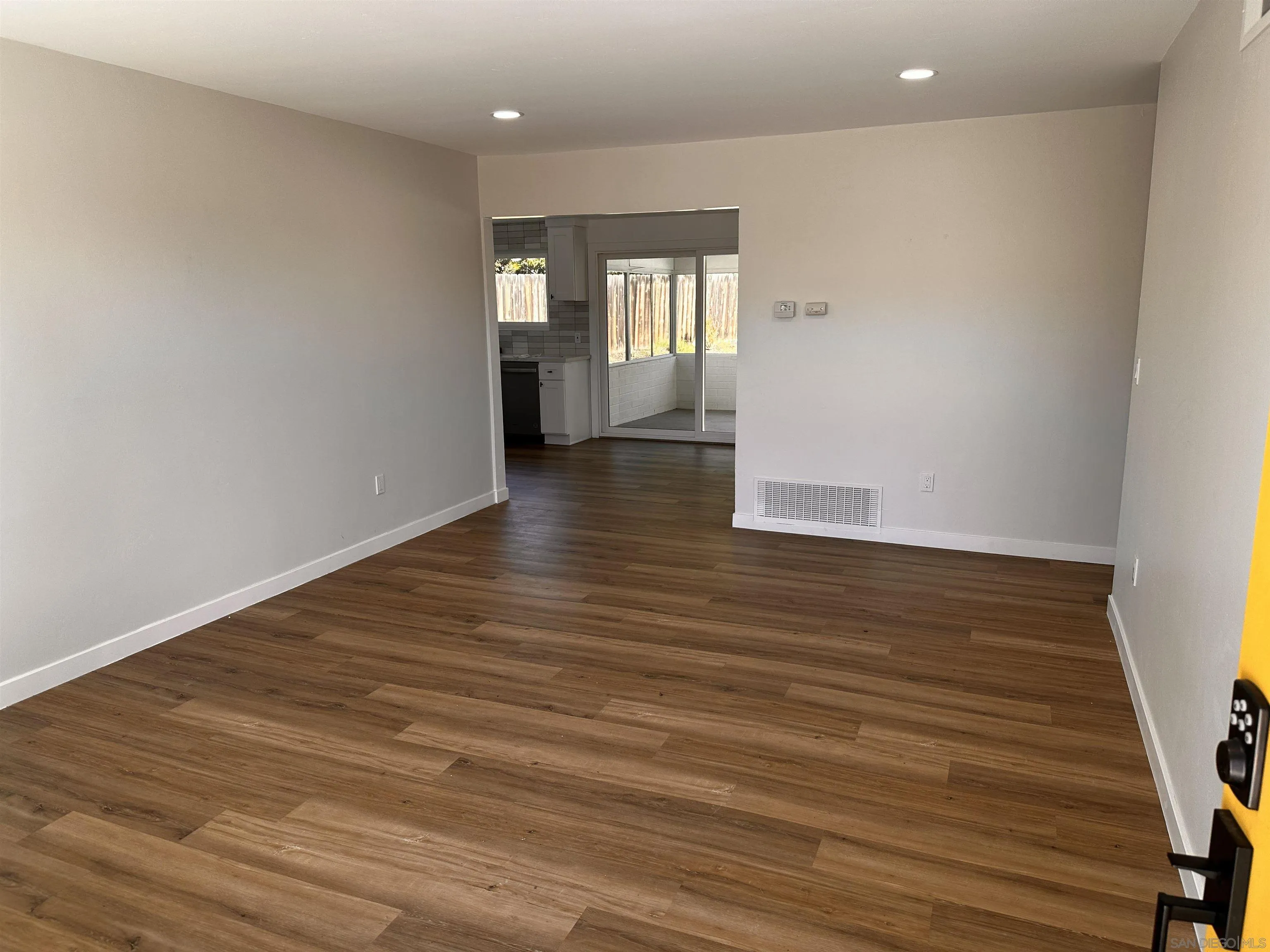 12733 McFeron Road Poway, CA 92064 - Photo 4 of 69 wooden floor in an empty room with a window