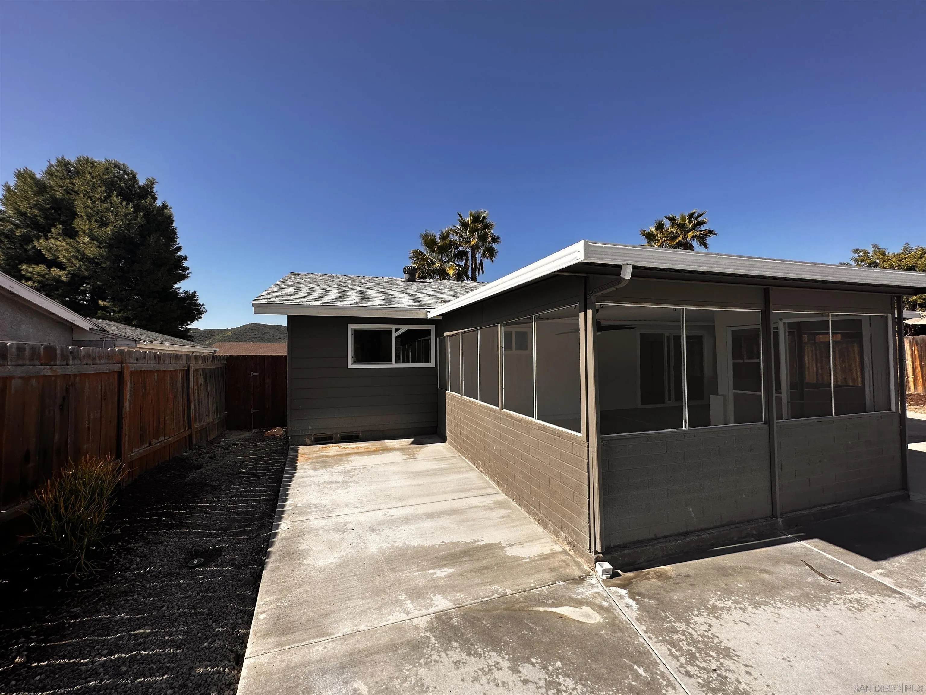 12733 McFeron Road Poway, CA 92064 - Photo 53 of 69 a front view of a house with a yard